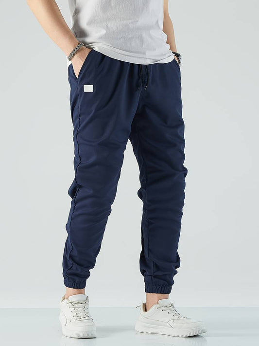 Freddie Relaxed Tapered Joggers | Drawstring Waist Side Pockets Joggers